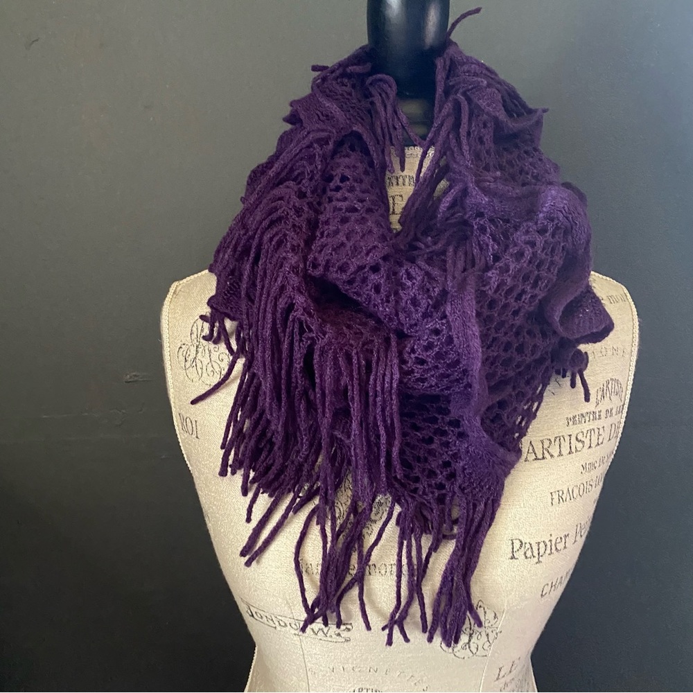 Purple knit ruffled infinity scarf with fringe